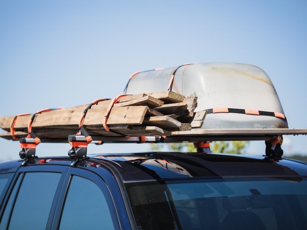 How to Tie Luggage Down with Roof Rack Straps | WRAPTIE